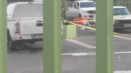Home Affairs car park where the body was found in a refuse bin in a bakkie.