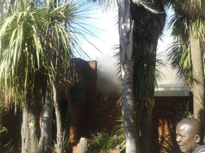 Smoke can be seen from the road.