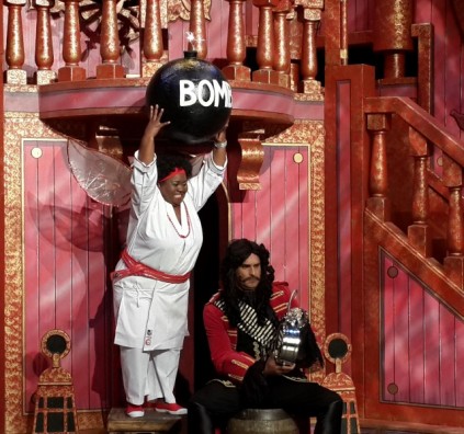 Tinkerbell (Thembsie Matue) and Captain Hook (Craig Urbani).