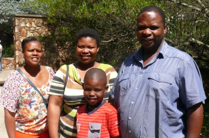 A very happy, Hope Mnguni (middle) with her proud parents, Elizabeth and Colin and brother, Sanele Mnguni.