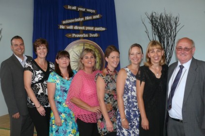 Mr Roger Looyen with his staff.