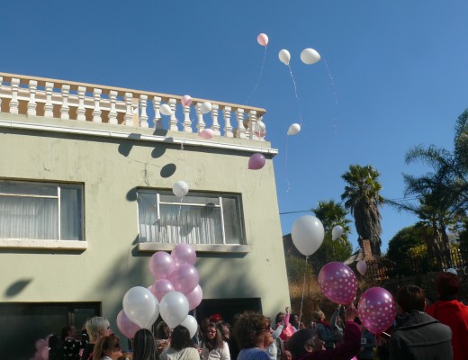 Balloons are set free in commemoration of Odette's life.