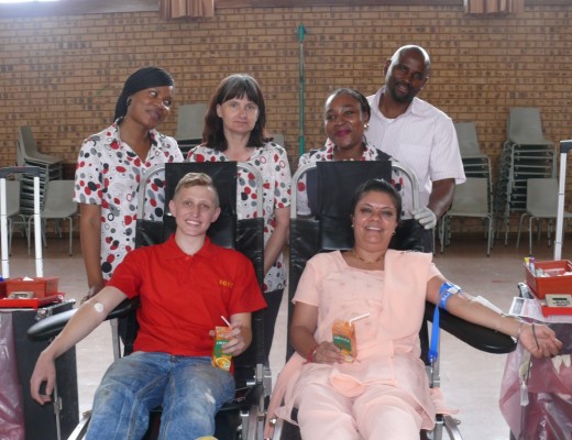 Donating blood at Mulbarton primary School, front: Braden Jouxson and Priya Keshav. Back: SANBS staff, Rembu Phampha, Marilyn Hawthorn, Thandi Dire and Thomas Golela.