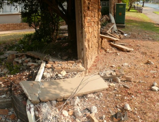 The aftermath: This is the wall which was destroyed as the BMW crashed into it. The driver didn't survive the crash.
